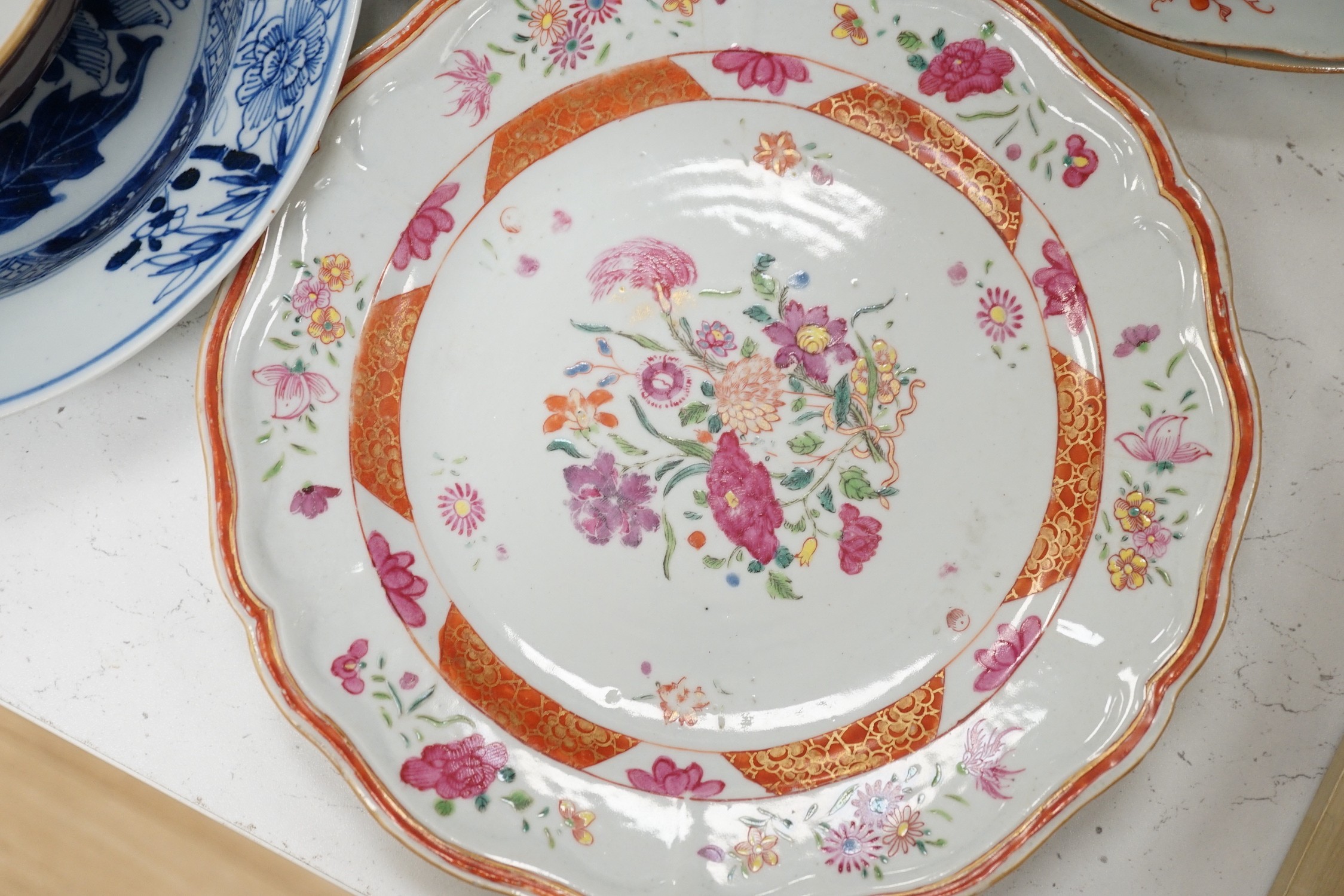 An assortment of Chinese porcelain tin-glazed earthenware charger and a Delft vase